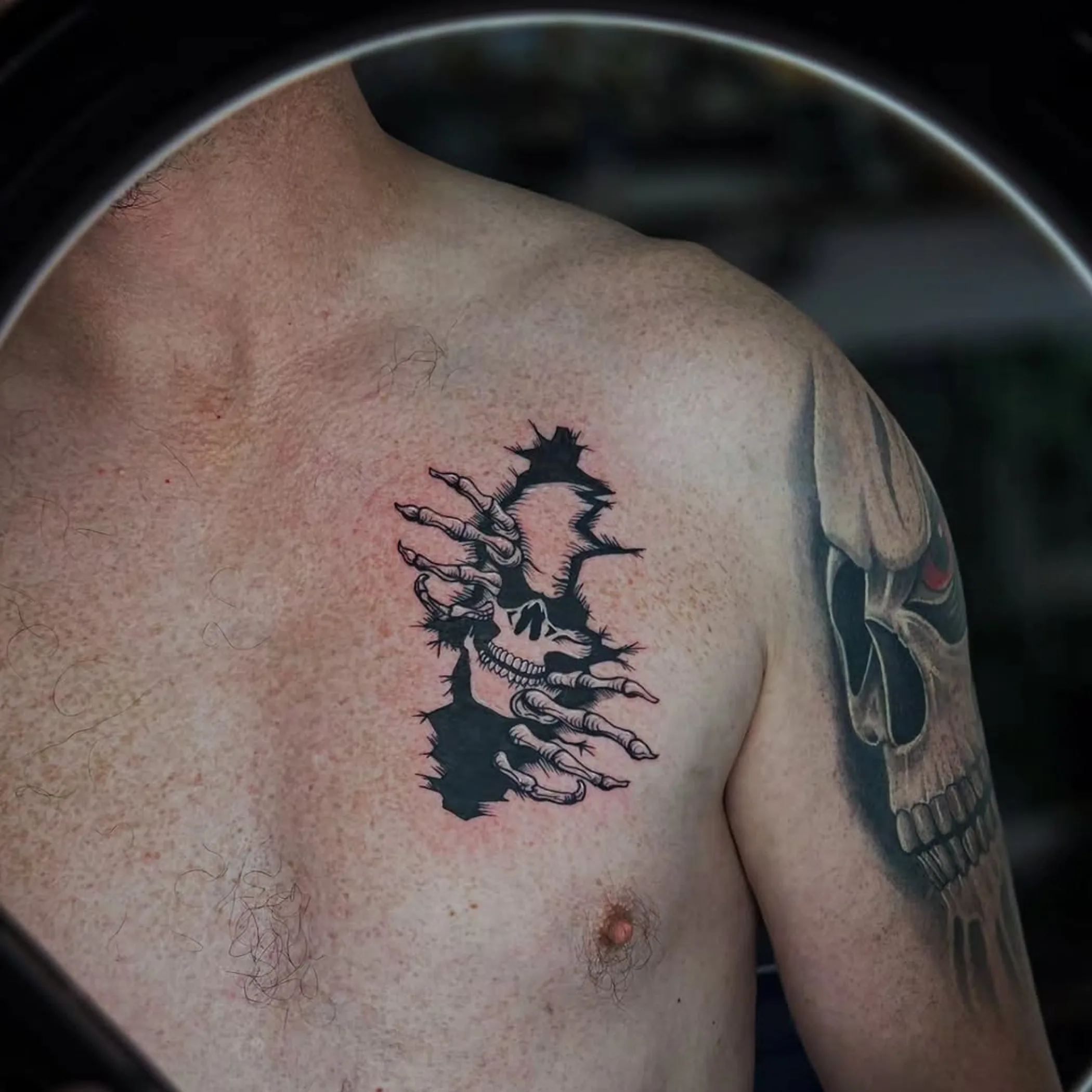 artist tattooing painful ribs area